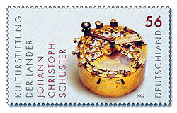 Rechenmachine von Joh. Chr. Schuster auf einer deutschen Briefmarke (2002)